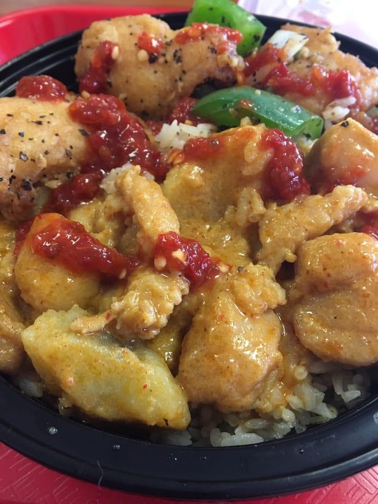 Photo of Thai Express - Newark, CA, United States. Chicken curry & blk pepper fish over fried rice lunch
