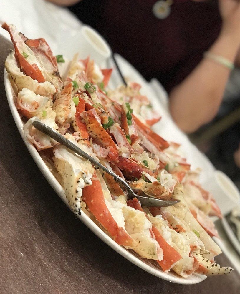 Photo of Pearl Bay Tea House - San Leandro, CA, United States. King crab, steamed wit garlic and rice noodles underneath