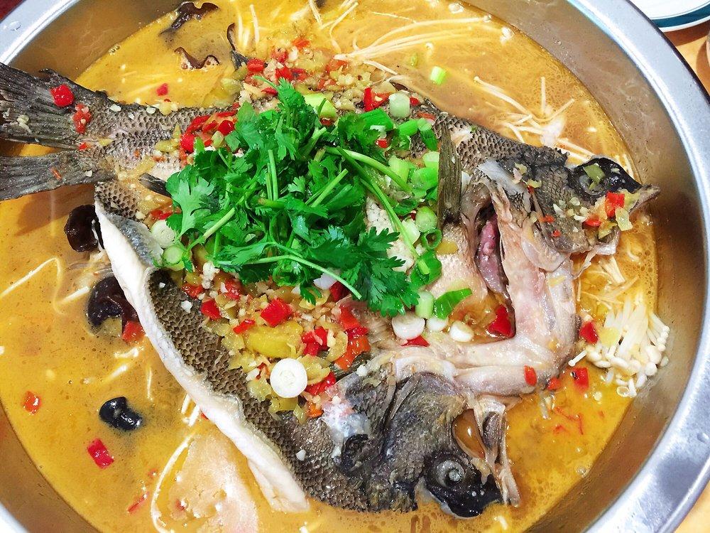 Photo of Jiangnan Delight - Fremont, CA, United States. Whole fish in flaming pot